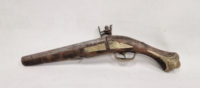 Reproduction flintlock pistol with brass mounts