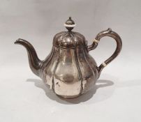 Early 19th century Russian silver teapot of lobed baluster form, on circular foot, marked 'HK 84',