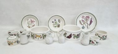 Two large Portmeirion 'Botanic Garden' serving dishes, four teacups, lidded sugar bowl, two sugar