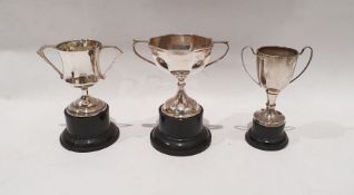 Silver trophy cup, octagonal, on plastic base, 72.4g approx. (no inscription), a small trophy cup,