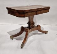 Early 19th century brass inlaid rosewood foldover top card table, square with cut-off corners, brass