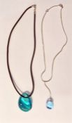 Baccarat blue glass pendant of teardrop form and the black fabric necklace, cased and a Baccarat