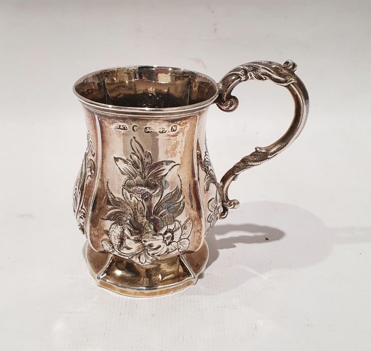 Victorian silver christening mug, baluster shaped, panelled with floral repousse, scroll handle,