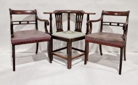 Pair of Regency mahogany carver chairs on reeded sabre front legs and a Georgian corner chair with