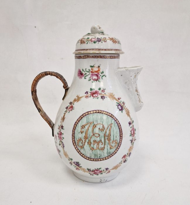 Chinese export porcelain covered jug of baluster shape with shell spout, all painted in famille rose