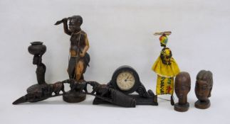 Collection of carved African figures and heads, a wooden mantel clock, etc