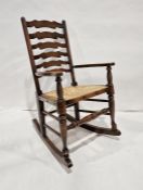 20th century ladderback rocking chair with rush seating