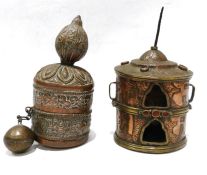 Two 19th century or later, engraved copper Tibetan prayer wheels.