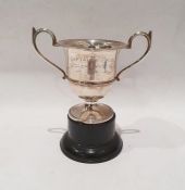 Silver trophy cup dated 1934, on wooden stand, 143g approx.