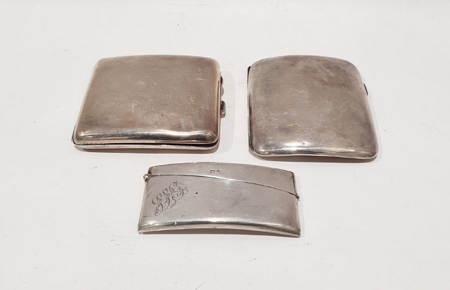 Two silver cigarette cases with gilt washed interiors and a silver card case, 7.1ozt (3)