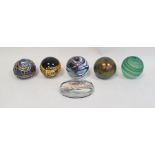 Okra iridescent glass paperweight by Richard Golding, a Royal Brierley iridescent glass paperweight,