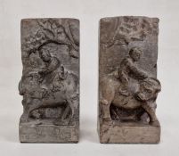 20th century Chinese-style bookends of carved polished stone with figures riding bull