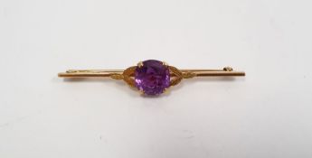 9ct gold and amethyst bar brooch set single cushion-shaped stone flanked by pair foliate supports