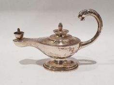 Mappin & Webb table/cigar lighter in the form of Aladdin’s lamp with mask handle, on oval foot,