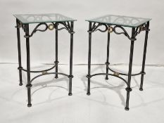 Two 20th century glass-topped side tables with iron bases (2)