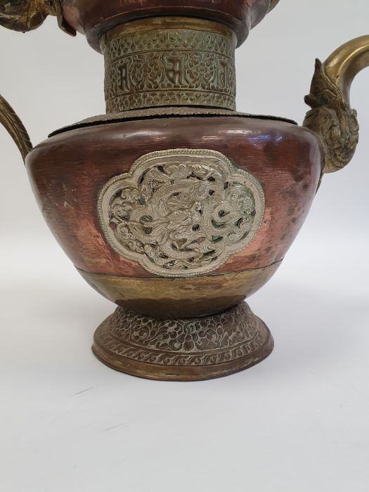 Late 19th century or later, Tibetan copper and brass fitted teapot, with Naga form handle. - Image 5 of 33