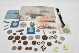 Silver-coloured box containing a man's watch, a driving licence book from 1954, assorted coins