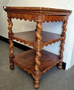 20th century three-tier occasional table of square form, on barleytwist supports, 53cm x 77cm
