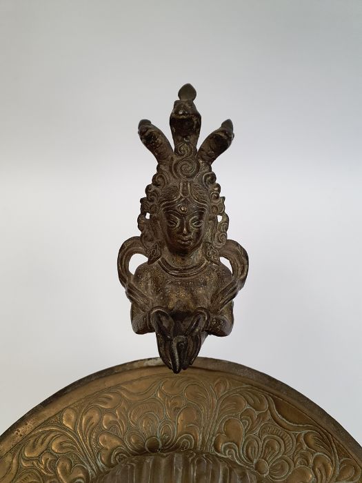 Late 19th century or later, Tibetan copper and brass fitted teapot, with Naga form handle. - Image 14 of 33