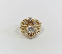 14K gold and diamond suite of split-shank diamond ring set two trios of small diamonds and centred