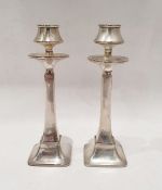 Pair of George V silver weighted candlesticks, Birmingham 1924 by Charles S Green & Co Ltd