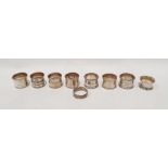 Nine assorted silver napkin rings, various dates and markers, 5ozt