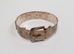 Silver bangle in the form of a belt with buckle