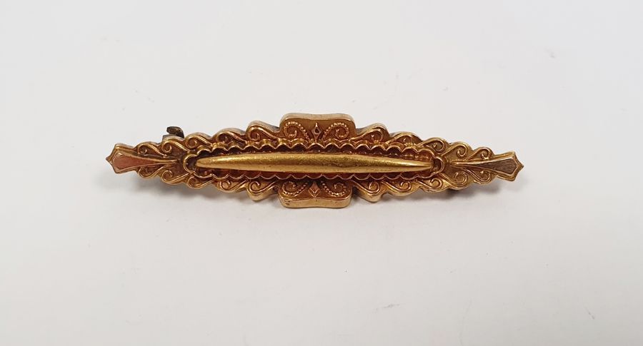 15ct gold shaped bar brooch, the central bar surrounded by applied scrollwork in Gieves Limited blue