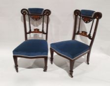 Pair of Edwardian inlaid bedroom chairs with blue upholstered head rests and seats, parquetry inlay,