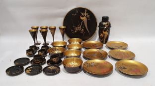 A 1940's Japanese lacquer cocktail and coffee set with gold detailing and bird imagery to include