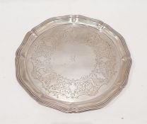 Edward VII silver salver of lobed circular form, engraved scrolling and shell decoration, central