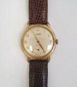 Gent's 1950's Tissot rolled gold wristwatch with Arabic numerals to the circular dial, subsidiary