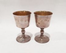 Two silver goblets with gilt washed interiors, on circular feet, by Mappin & Webb, Birmingham