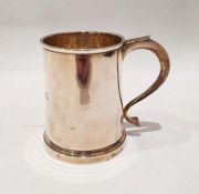 Silver presentation mug, initialled, with thumbpiece and scroll handle, London 1937Condition