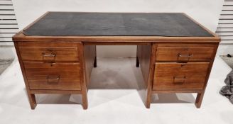 20th century desk, the rectangular top with rounded corners and inset leather, the pedestals with