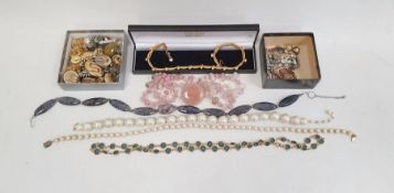 Quantity of clip-on earrings, large jewelled brooch, many beaded necklaces  (1 box)