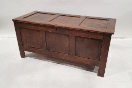 18th century oak coffer with panelled top and front, on style supports, 111cm x 52cm Condition