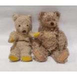 Two mid-20th century golden/blonde straw stuffed teddy bears with felt pads  (One with plastic