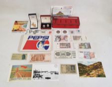 Quantity of collectables including vintage thrift tin, banknotes, coins, stamps, Pepsi sticker and