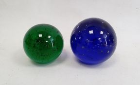 Glass paperweight in green, with bubbled decoration similar blue paperweight (2)