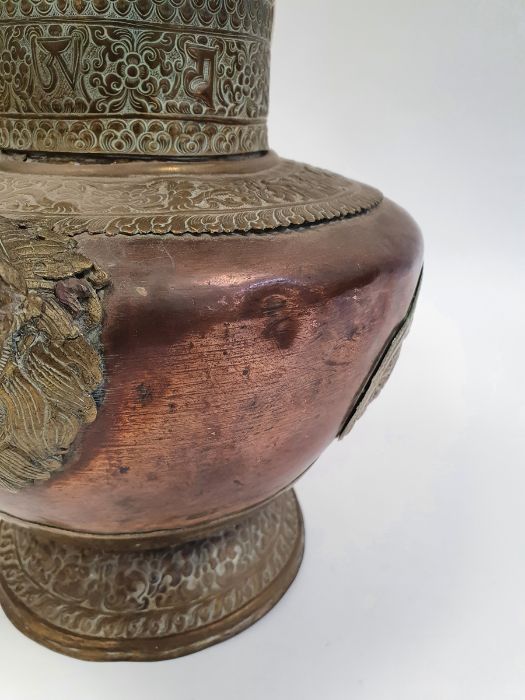 Late 19th century or later, Tibetan copper and brass fitted teapot, with Naga form handle. - Image 11 of 33