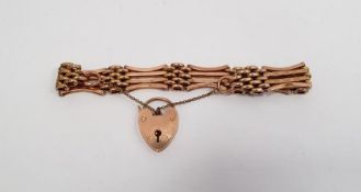 9ct gold gate-pattern bracelet, scroll and punch engraved, with heart-shaped padlock clasp,