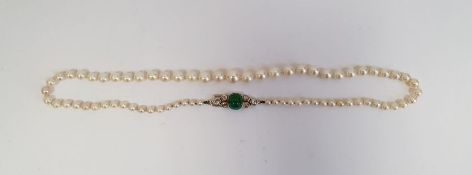Cultured pearl necklace, single-strand, graduated and the cabochon emerald and diamond set Art