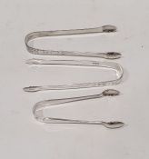 Three silver sugar tongs to include George III sugar nips, London 1807 by Samuel Godbehere, Edward