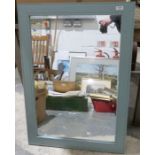 Modern rectangular wall mirror with green frame