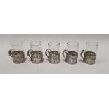 Possibly German glass shot glasses with silver mounts and handles, indistinctly marked to base (