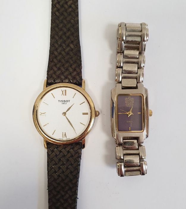 Gent's Tissot gilt metal wristwatch with leather weave strap and a lady's Paolo Gucci stainless