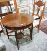 20th century mahogany circular centre table on moulded tapering supports and a chair