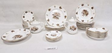 Royal Worcester china dinner service, mainly for six, decorated in brown and blue with foliage and