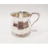 George V silver mug of faceted baluster form, on circular foot, London 1910, William Comyns &